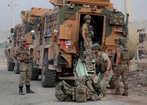 Türkische Soldaten neben gepanzerten Fahrzeugen nahe der syrischen Grenze, Oktober 2019